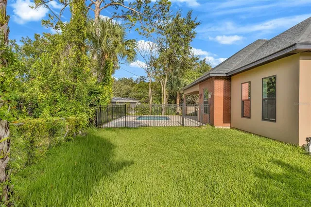 a view of outdoor space yard and swimming pool