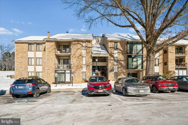 a car parked in front of a building