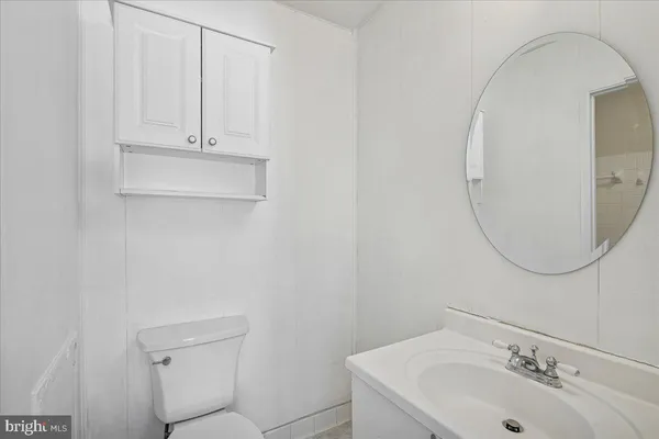 a bathroom with a sink and mirror