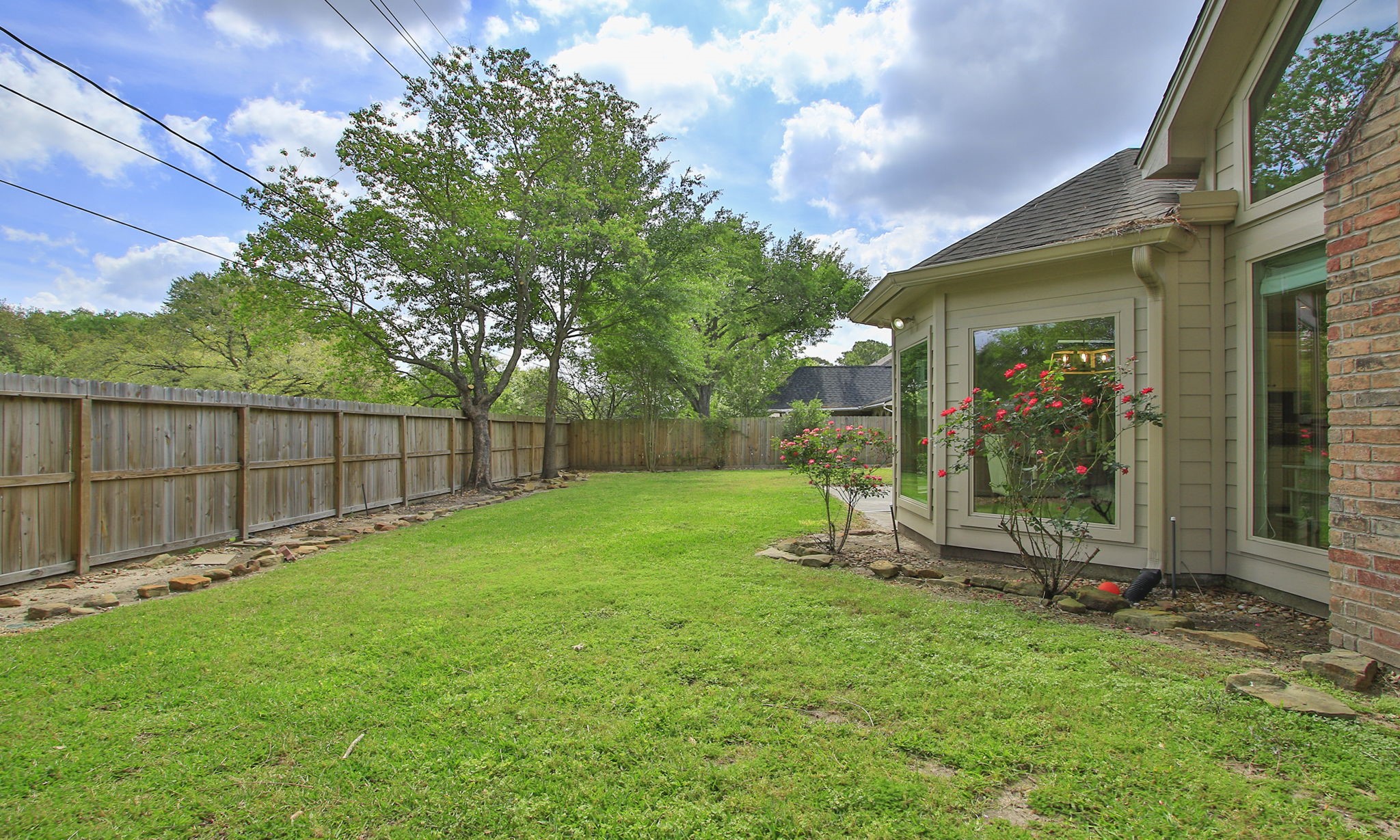 17618 Hidden Forest Drive Spring, TX 77379 - Photo 44 of 49 a view of a backyard with a garden