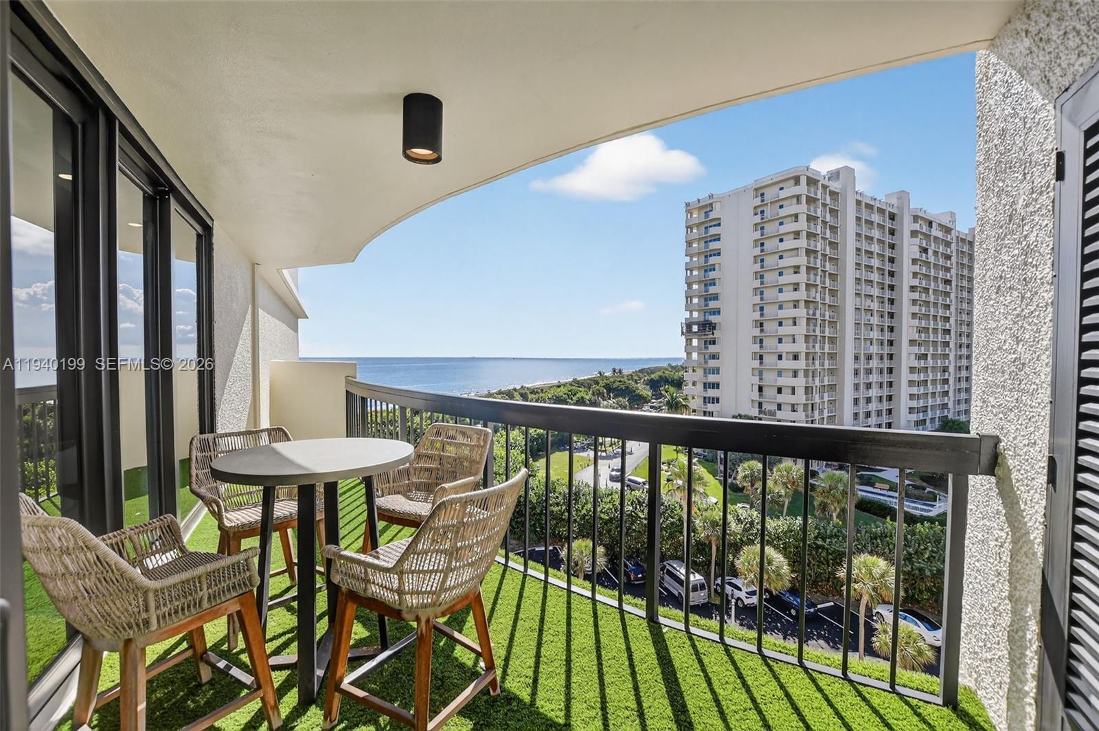 4545 North Ocean Boulevard, Unit 8B Boca Raton, FL 33431 - Photo 28 of 78 a view of a balcony with chairs