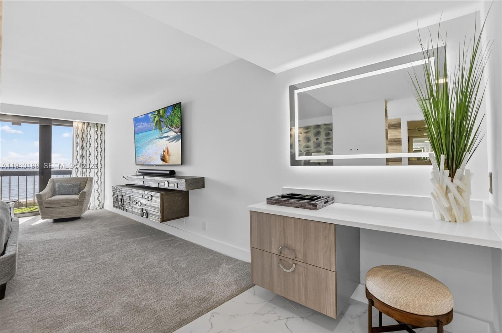 4545 North Ocean Boulevard, Unit 8B Boca Raton, FL 33431 - Photo 36 of 78 a kitchen with stainless steel appliances a stove a sink and a potted plant