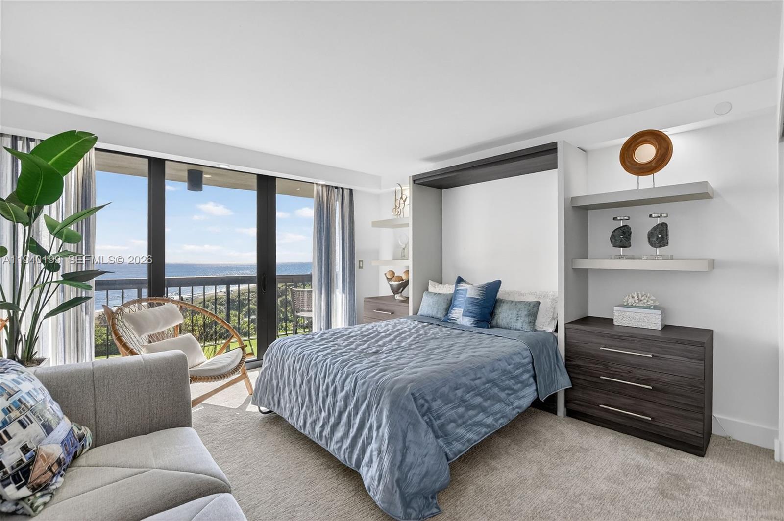 4545 North Ocean Boulevard, Unit 8B Boca Raton, FL 33431 - Photo 51 of 78 a bedroom with a bed and a large window