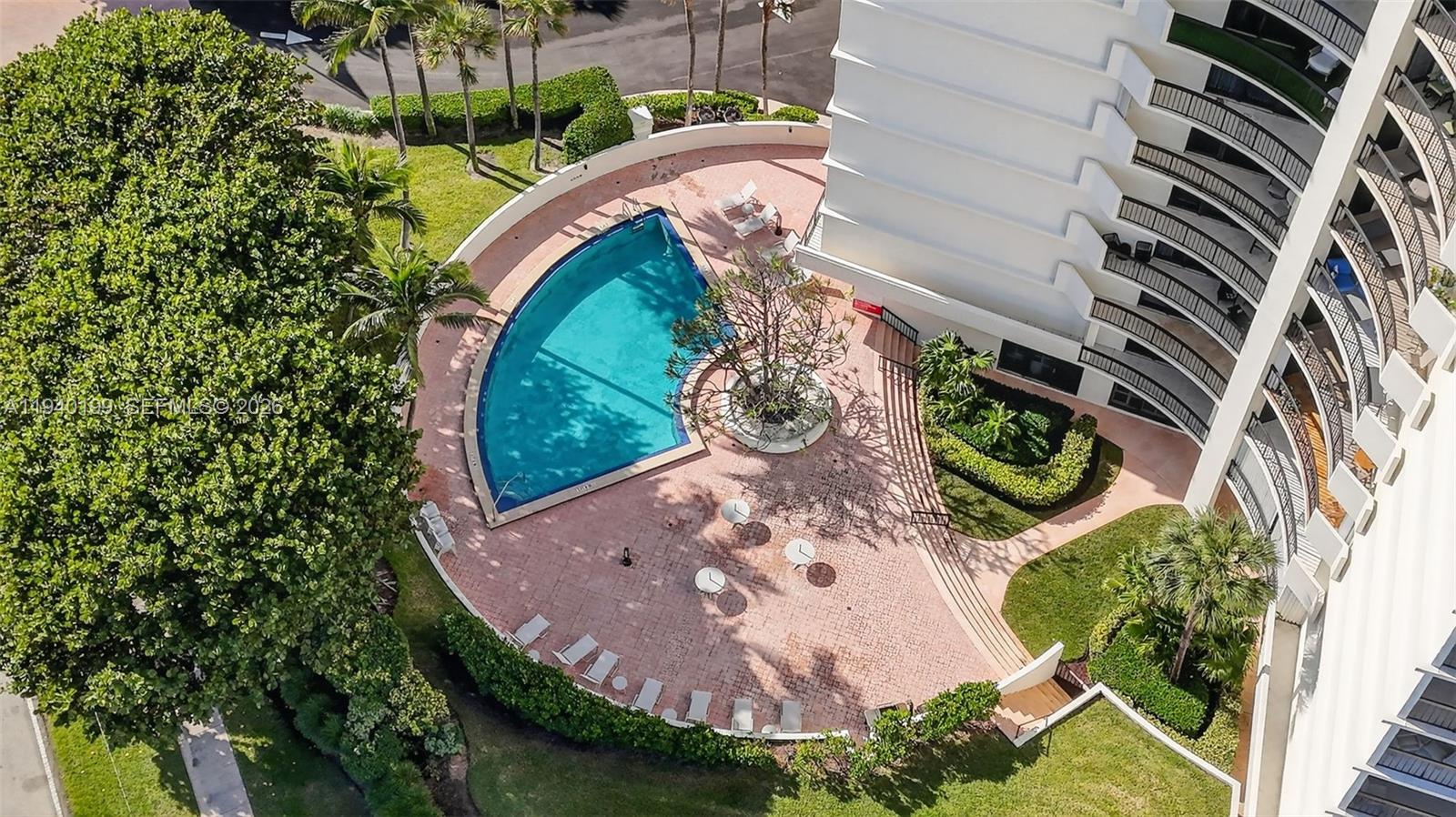 4545 North Ocean Boulevard, Unit 8B Boca Raton, FL 33431 - Photo 66 of 78 an aerial view of a house with outdoor space and trees all around