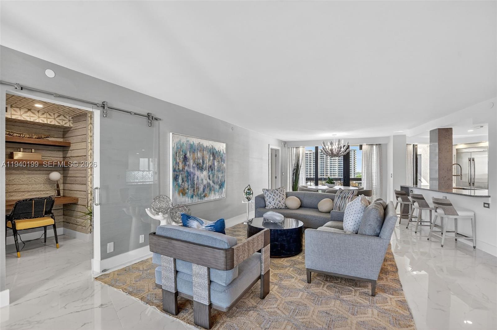 4545 North Ocean Boulevard, Unit 8B Boca Raton, FL 33431 - Photo 8 of 78 a living room with furniture and a table