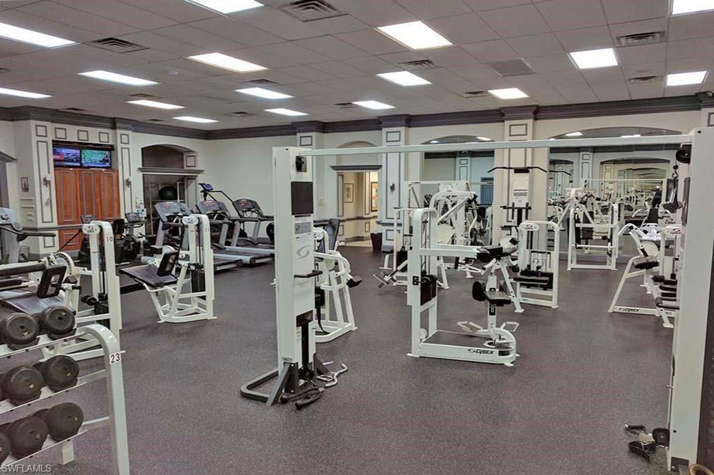 6017 Trophy Drive, Unit 601 Naples, FL 34110 - Photo 19 of 24 a view of a room with gym equipment