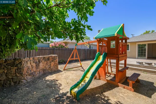 a bed room with a bed and a window