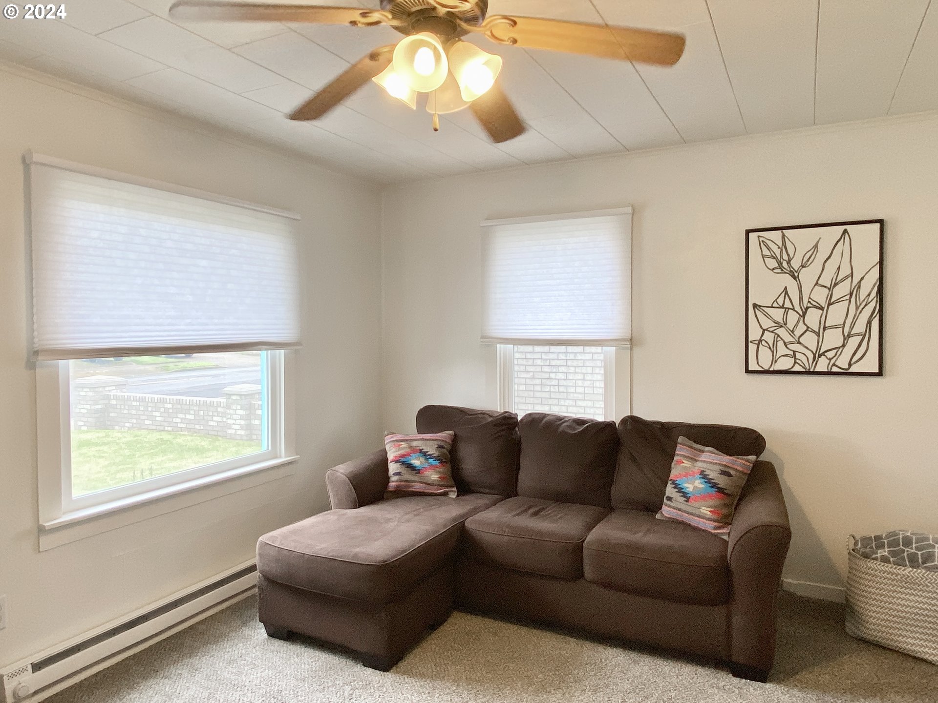 2425 E Street Springfield, OR 97477 - Photo 4 of 36 a living room with furniture and a window