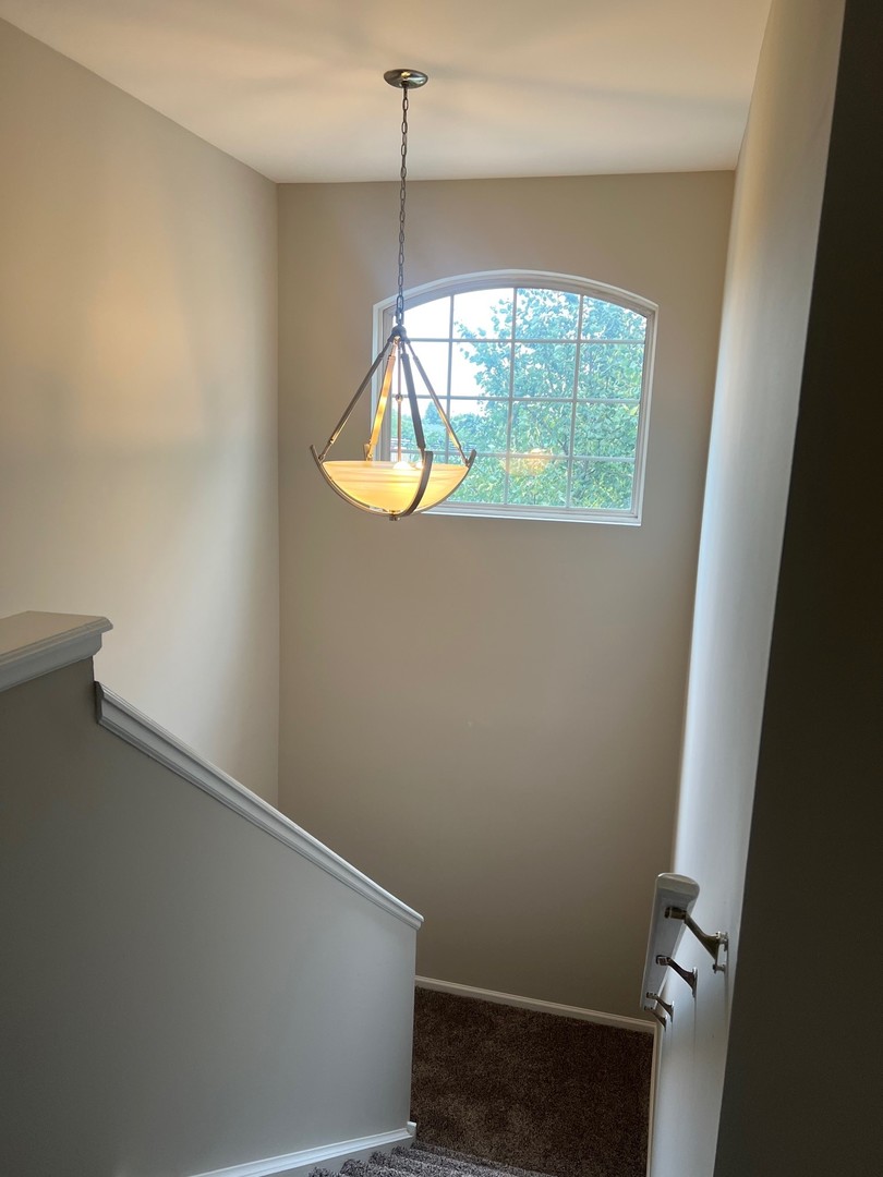 3393 Ravinia Circle Aurora, IL 60504 - Photo 10 of 14 an empty room with a window