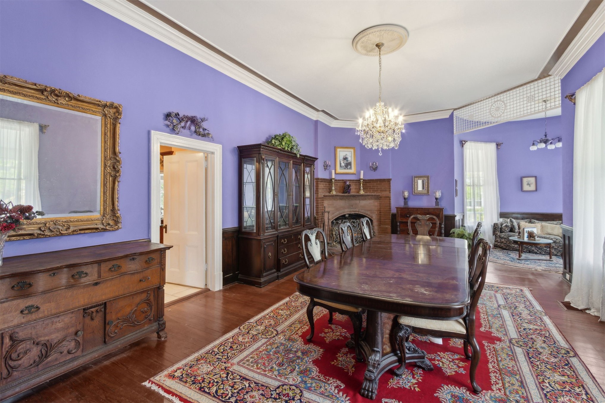 327 South 7th Street Fernandina Beach, FL 32034 - Photo 26 of 71 a view of a dining room with furniture and chandelier