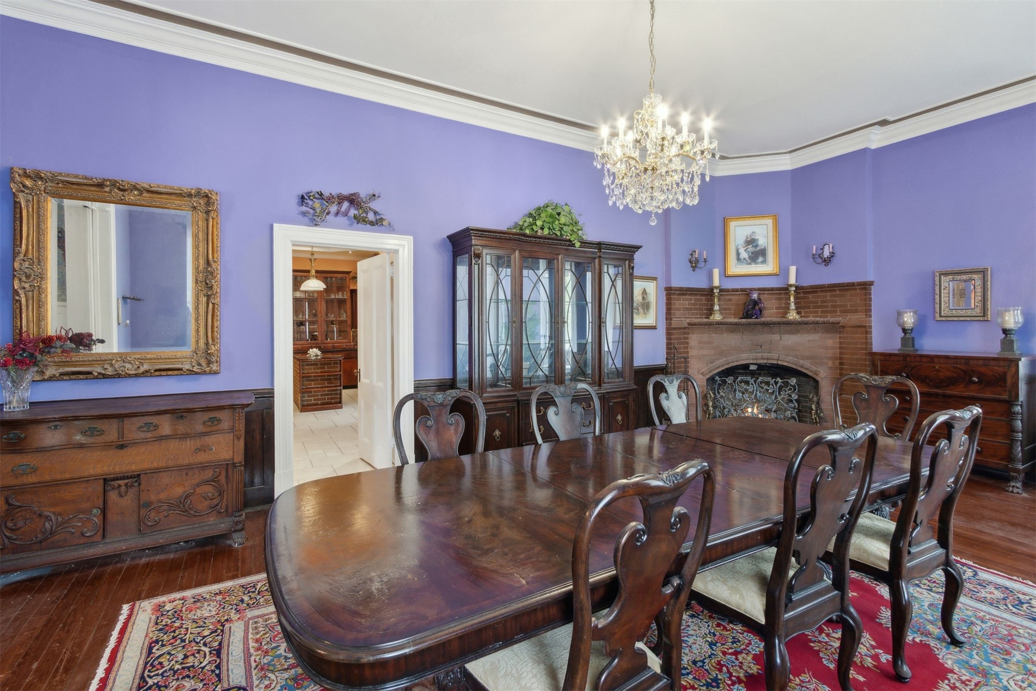 327 South 7th Street Fernandina Beach, FL 32034 - Photo 28 of 71 a view of a dining room with furniture and chandelier