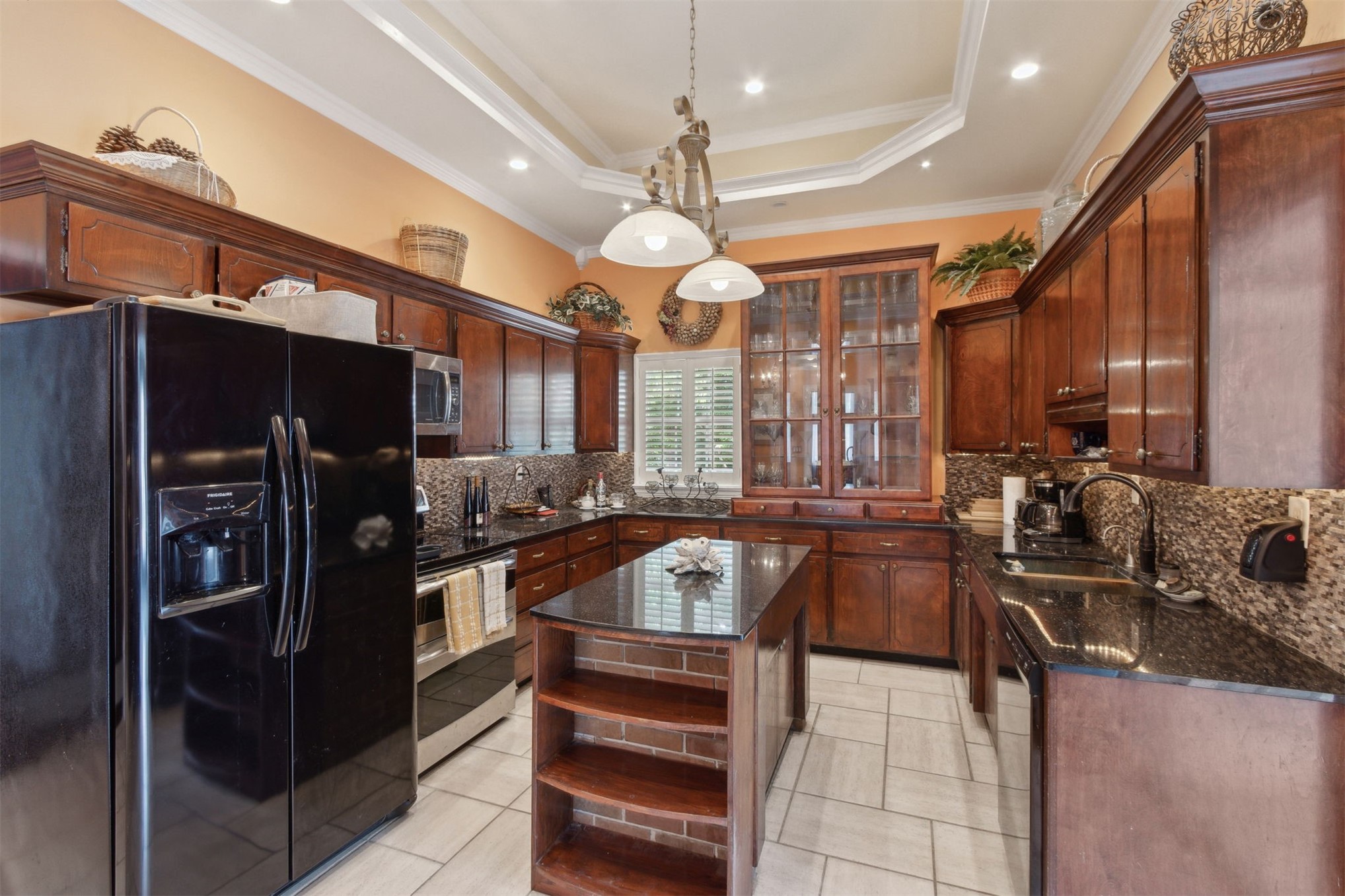 327 South 7th Street Fernandina Beach, FL 32034 - Photo 34 of 71 a kitchen with a sink appliances and cabinets