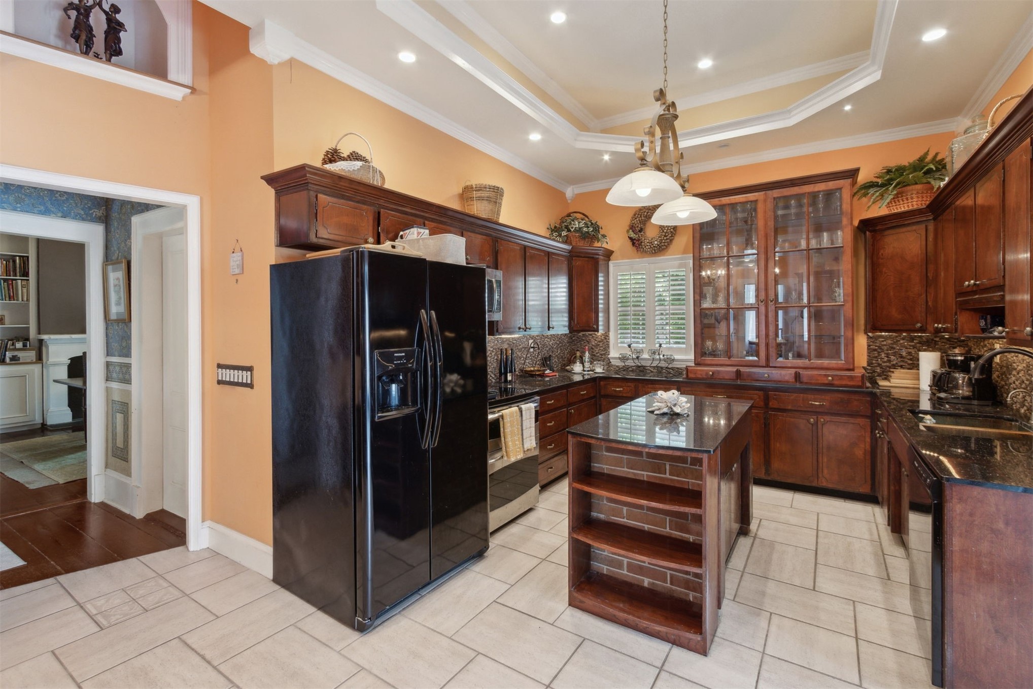327 South 7th Street Fernandina Beach, FL 32034 - Photo 35 of 71 a kitchen with stainless steel appliances granite countertop a refrigerator and a sink