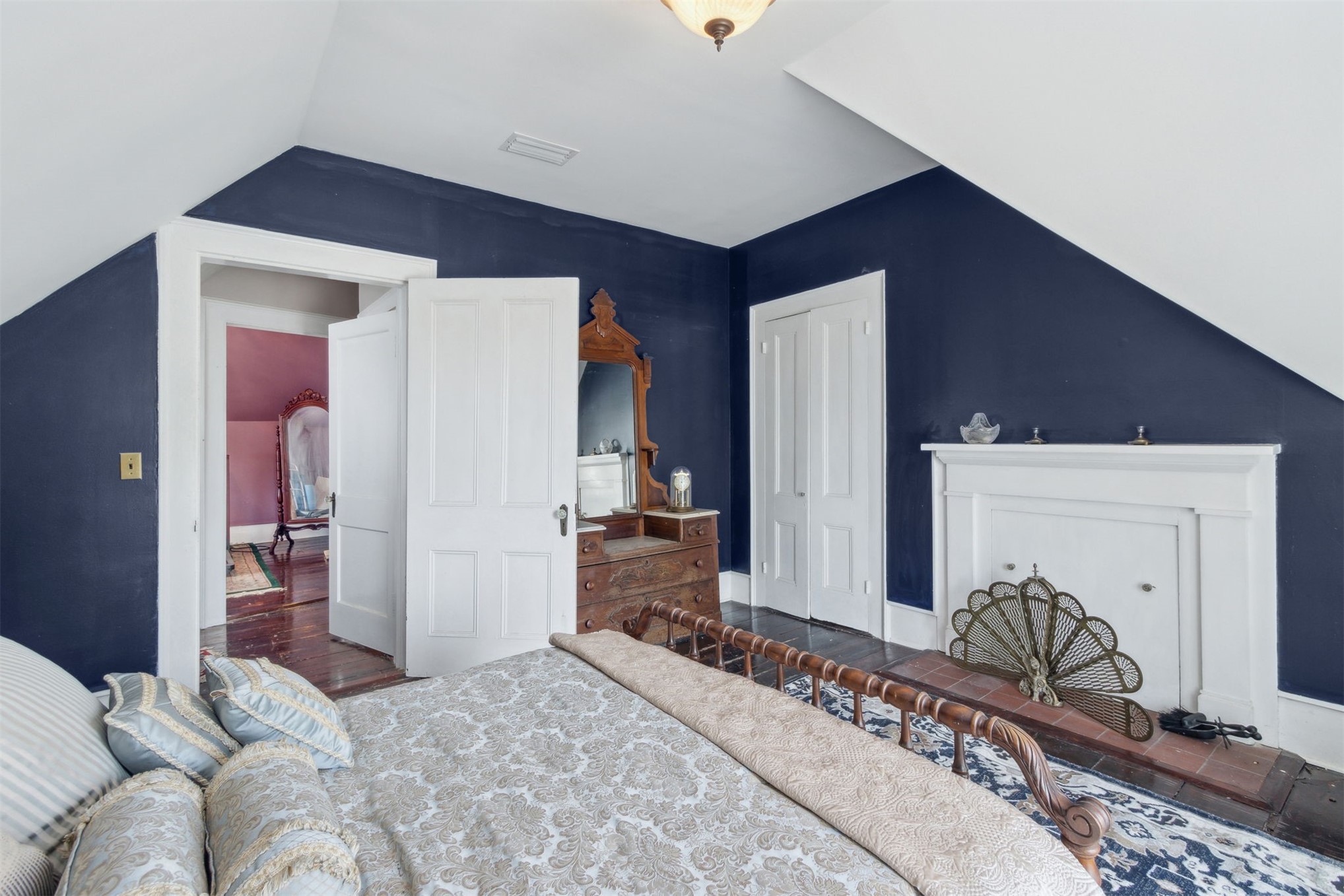 327 South 7th Street Fernandina Beach, FL 32034 - Photo 47 of 71 a bedroom with a bed and a dresser