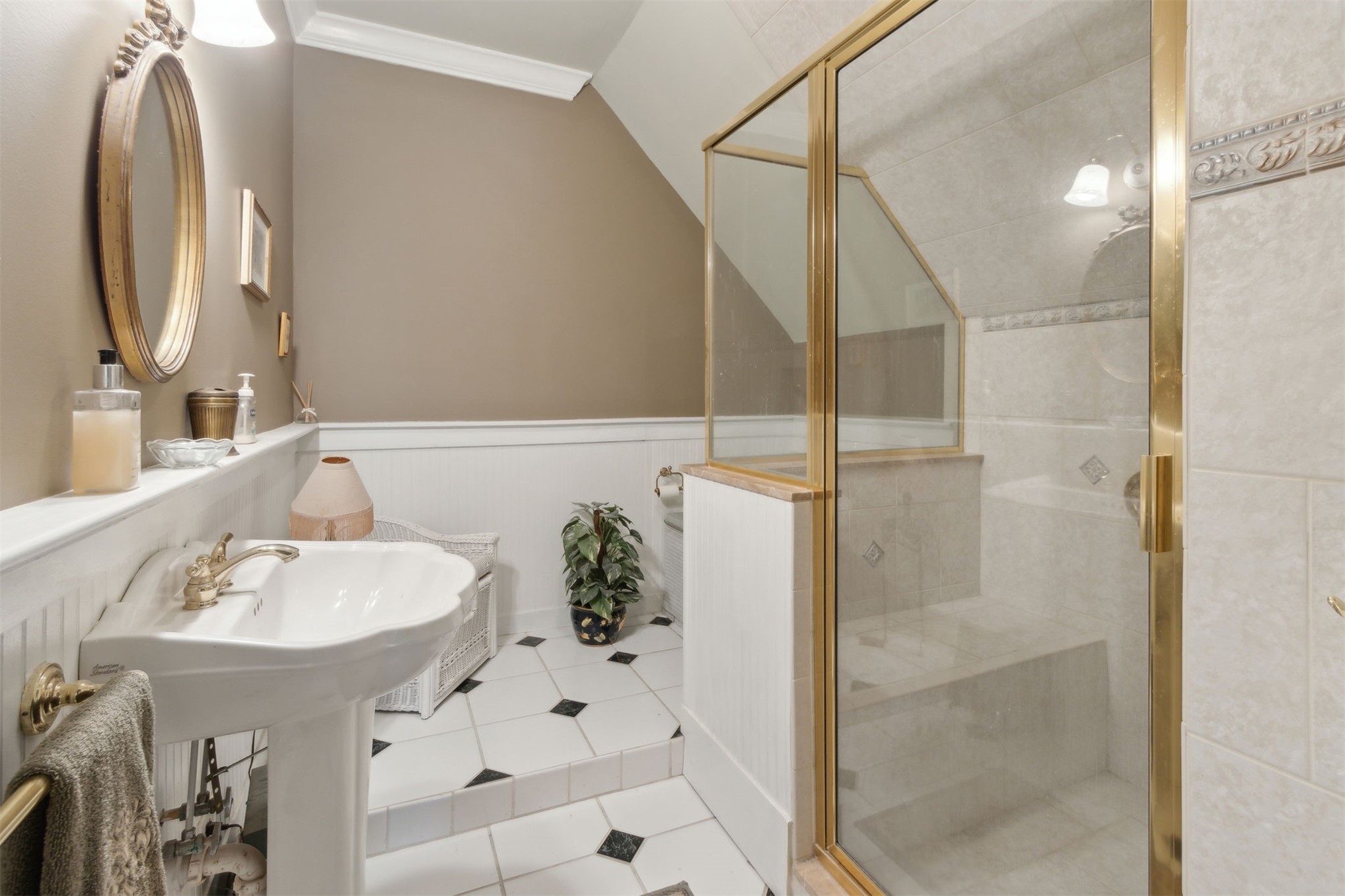 327 South 7th Street Fernandina Beach, FL 32034 - Photo 52 of 71 a bathroom with a sink and a mirror