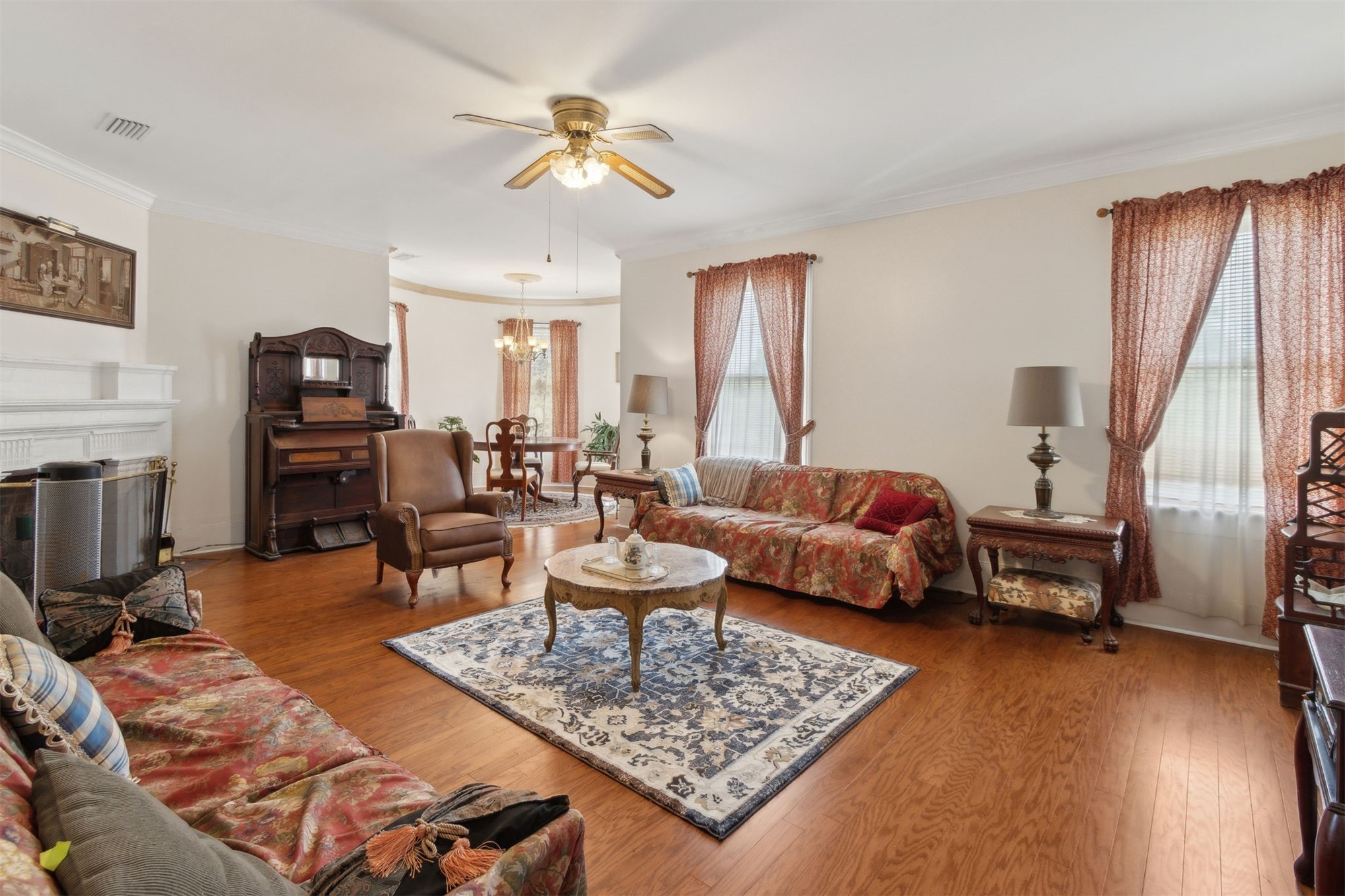 327 South 7th Street Fernandina Beach, FL 32034 - Photo 54 of 71 a living room with furniture and a chandelier