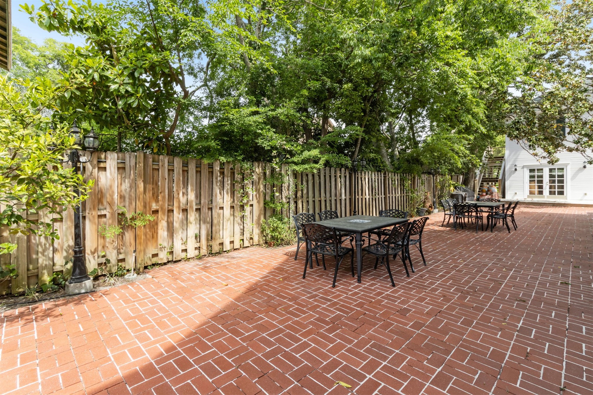 327 South 7th Street Fernandina Beach, FL 32034 - Photo 59 of 71 a view of a patio with a table and chairs