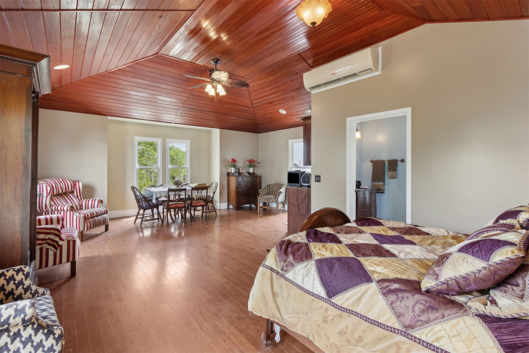 327 South 7th Street Fernandina Beach, FL 32034 - Photo 67 of 71 a bed room with a bed and chairs