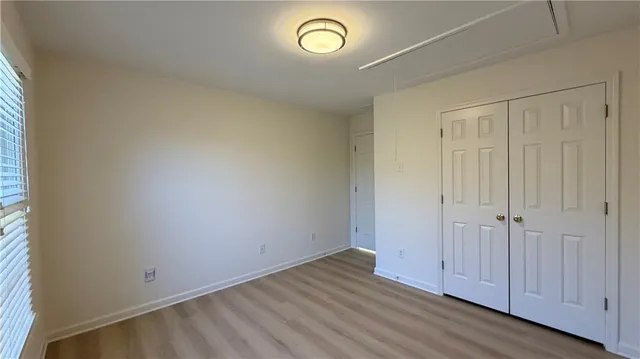 a bathroom with a sink double vanity granite toilet tub and shower