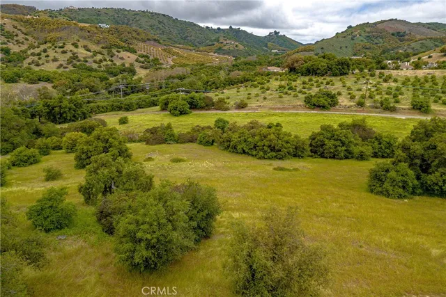 a view of an ocean and a mountain