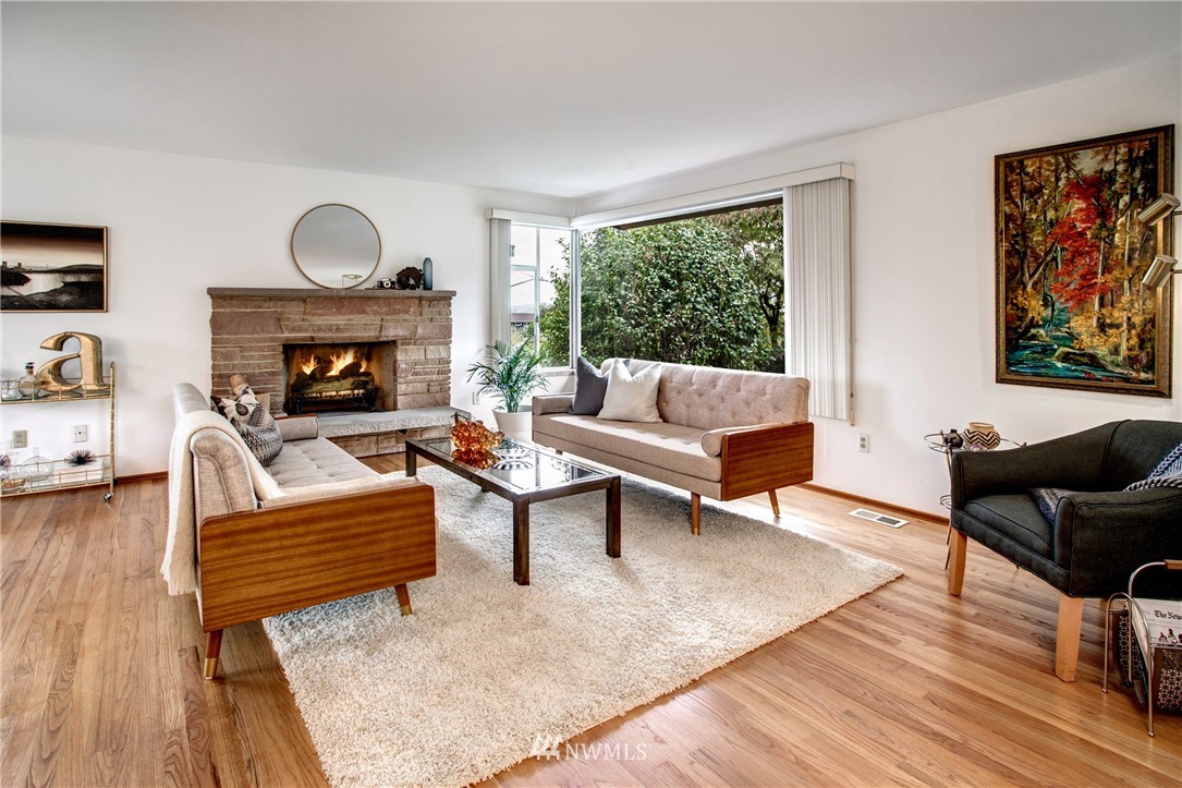 7620 South 115th Street Seattle, WA 98178 - Photo 5 of 33 a living room with furniture and a fireplace