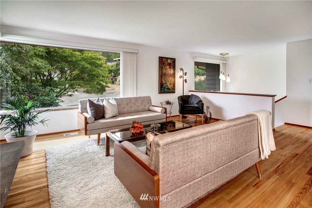 7620 South 115th Street Seattle, WA 98178 - Photo 6 of 33 a living room with furniture and a flat screen tv