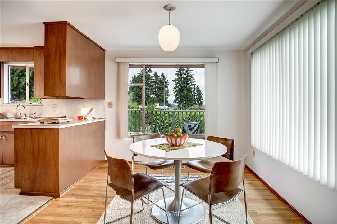 7620 South 115th Street Seattle, WA 98178 - Photo 8 of 33 a view of a dining room with furniture window and outside view