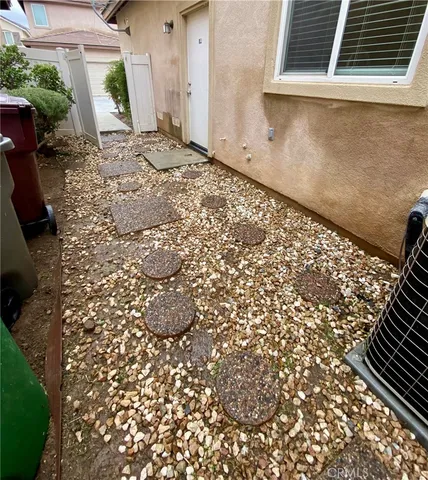 a view of a house with a garden