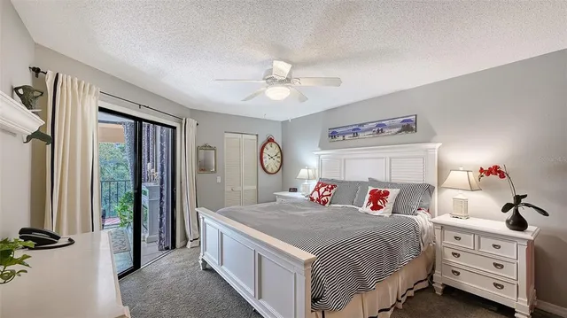 a bed room with a bed and a tv