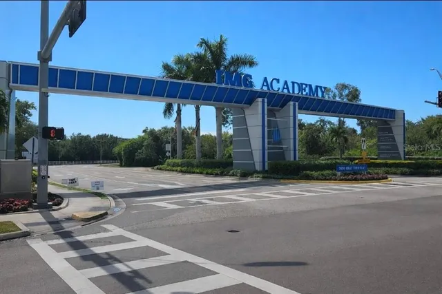 a view of a patio with a table and chairs
