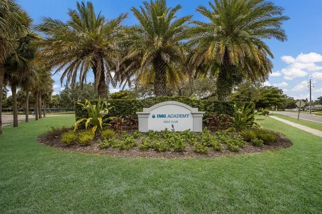 a view of a palm trees in front of a house
