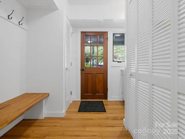 a view of a hallway with windows