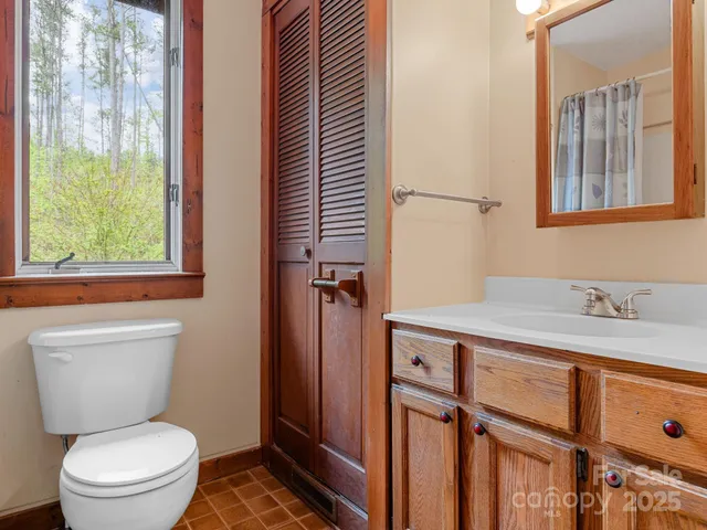 an empty room with closet area