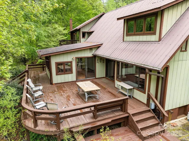 a view of a dinning tables and chairs in patio of the house