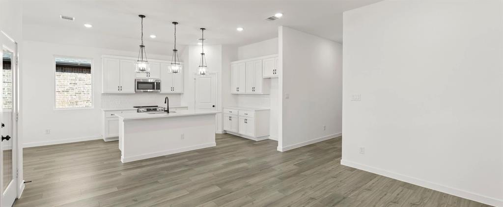 1018 Colgate Circle Princeton, TX 75407 - Photo 21 of 36 Open Living-Dining Room featuring the Harmony Collection