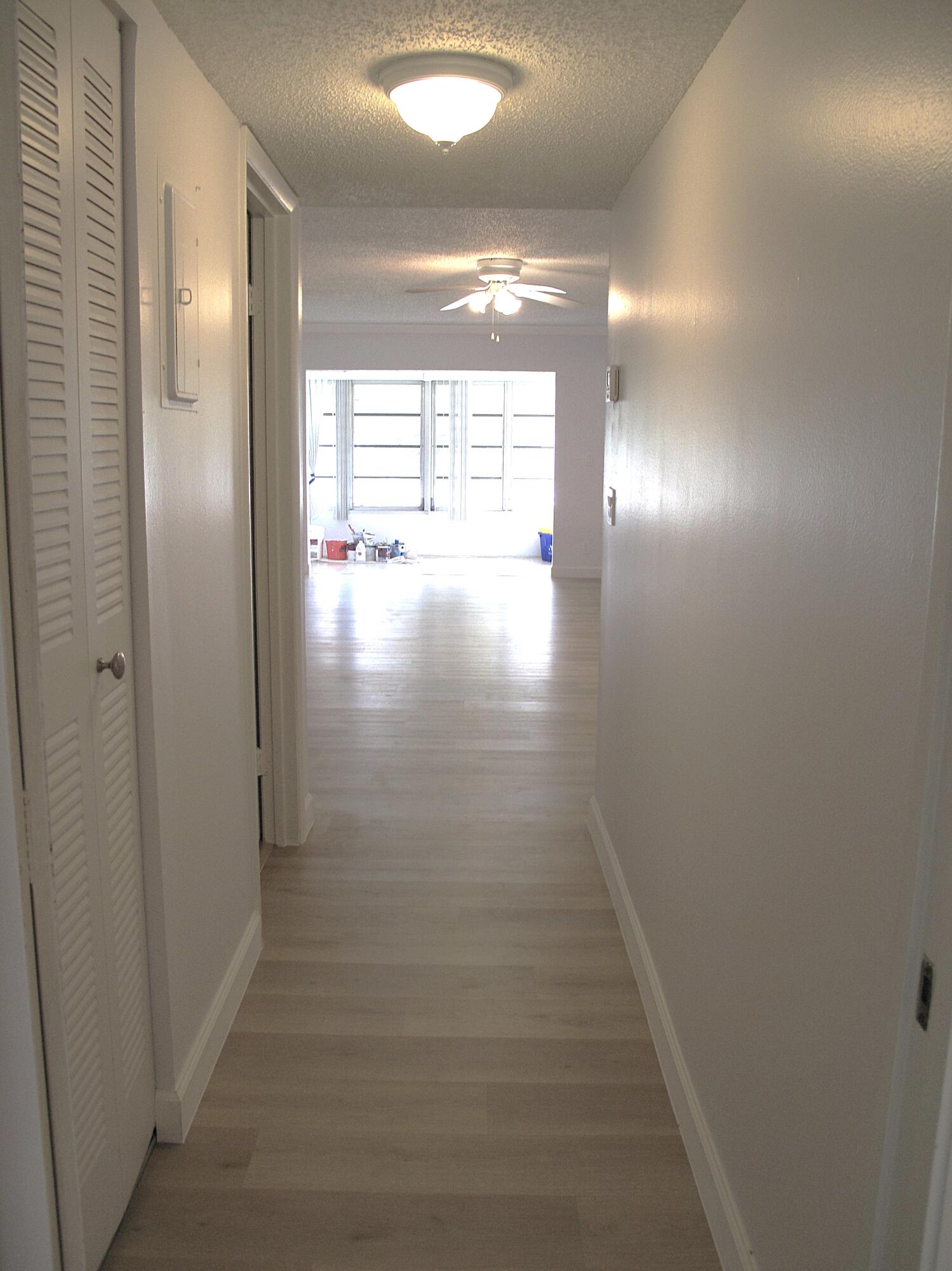 1102 North Drive, Unit C Delray Beach, FL 33445 - Photo 13 of 36 a view of hallway with natural light