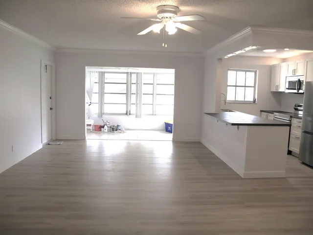 a view of an empty room and window