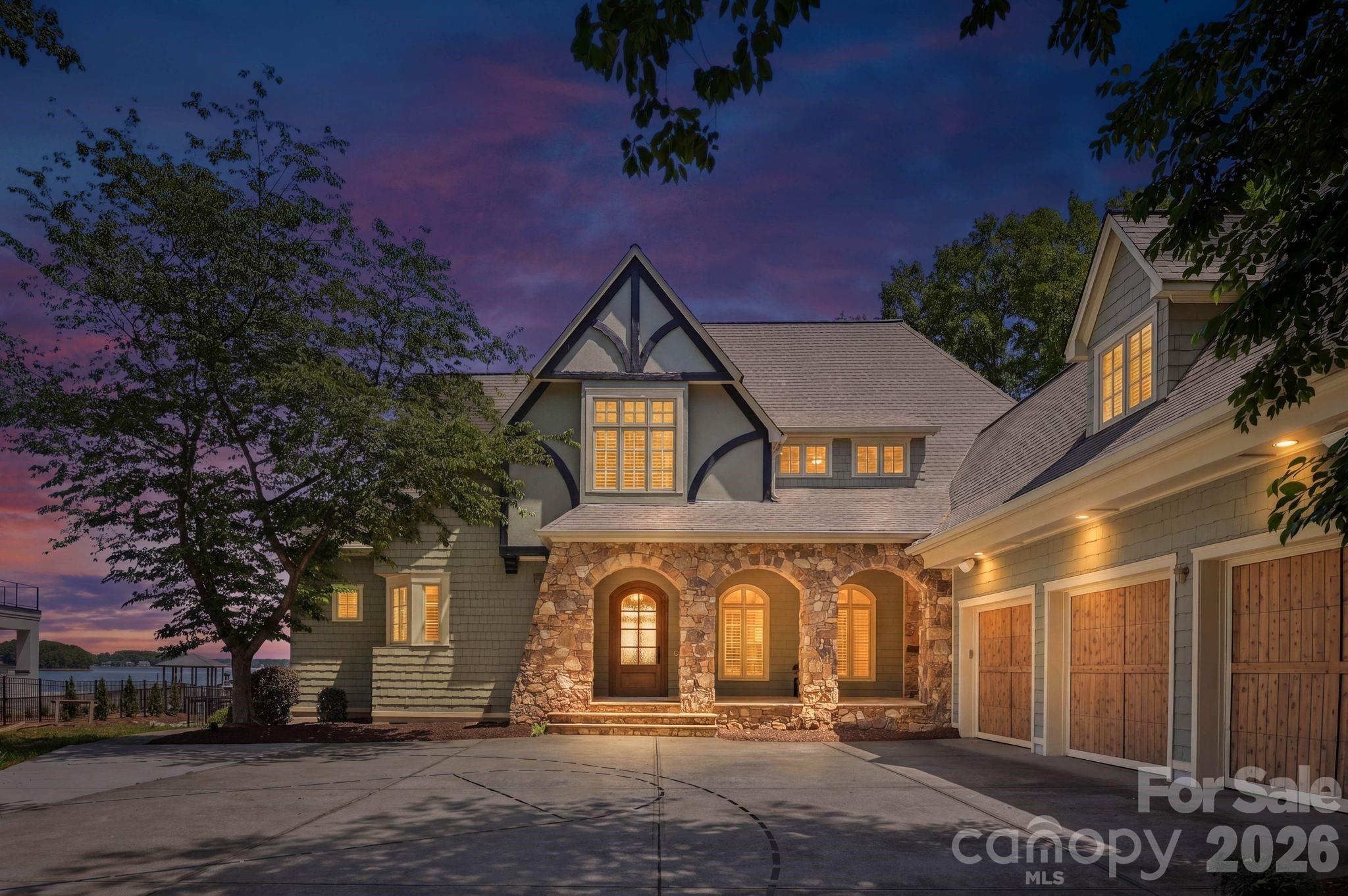 3900 Channel Point Lane Denver, NC 28037 - Photo 2 of 48 a front view of a house with a garden