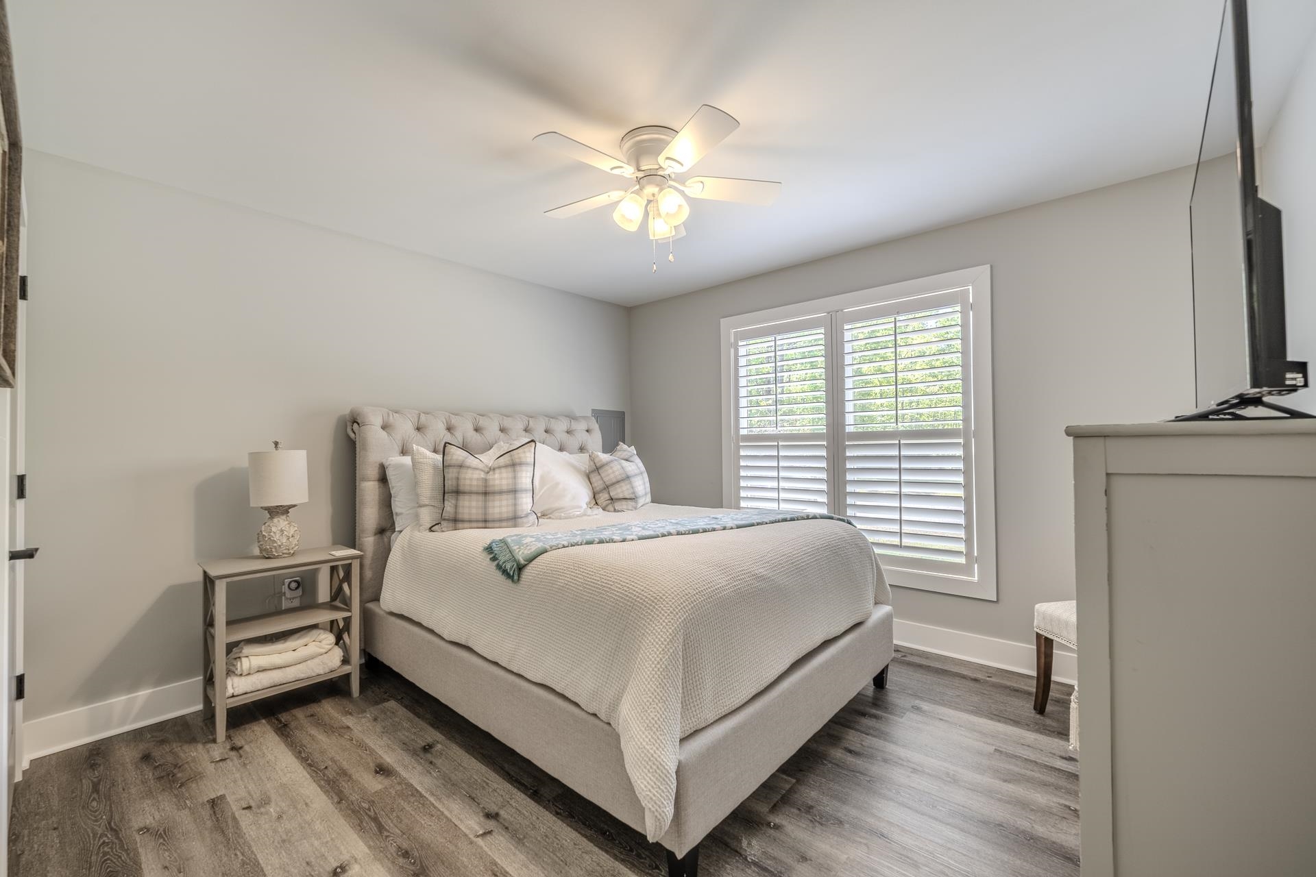 120 Rustic Trail Counce, TN 38326 - Photo 21 of 29 Bedroom with light wood-style floors and ceiling fan