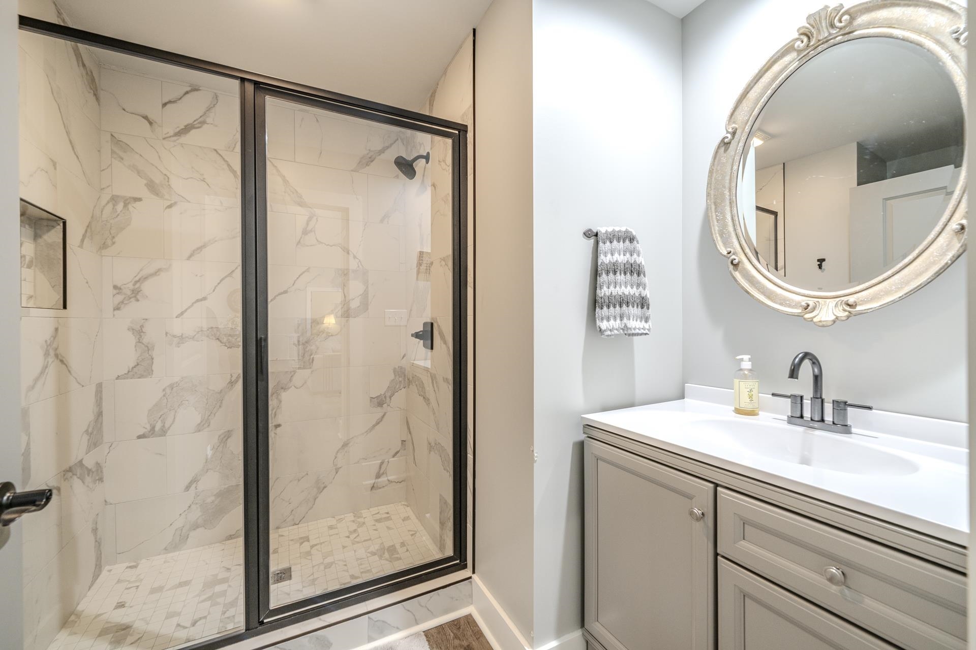 120 Rustic Trail Counce, TN 38326 - Photo 22 of 29 Bathroom with vanity and a marble finish shower