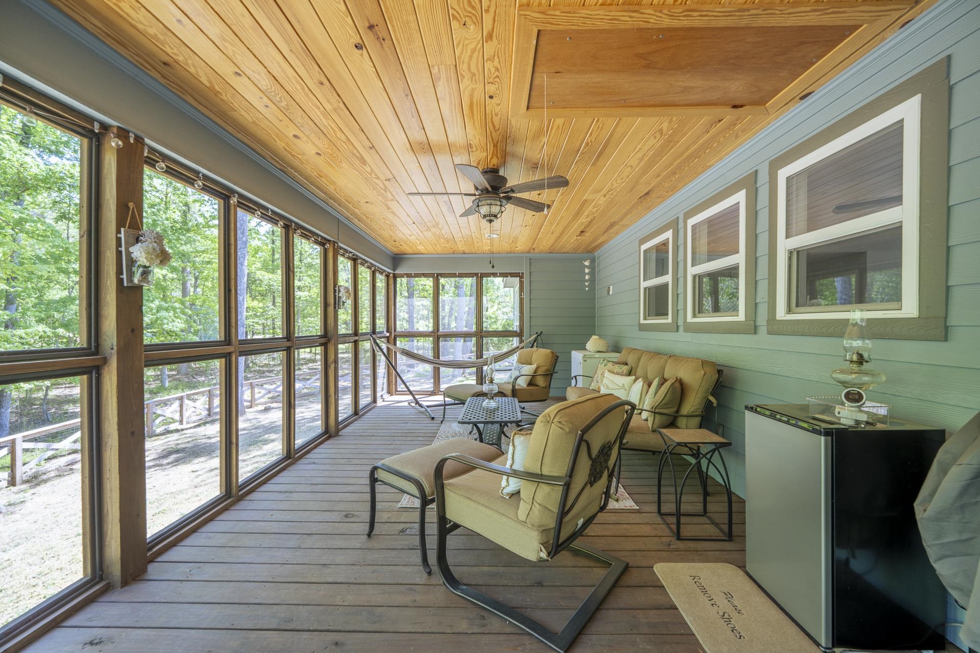 120 Rustic Trail Counce, TN 38326 - Photo 10 of 29 Sunroom featuring an outdoor living space and ceiling fan