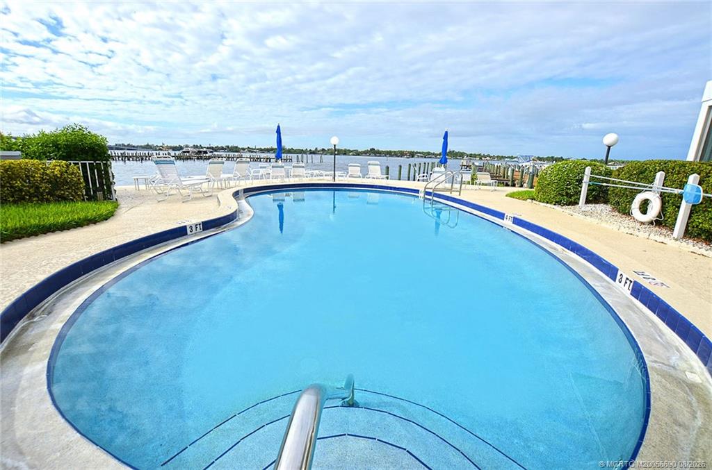 1862 Southwest Palm City Road, Unit 103 Stuart, FL 34994 - Photo 27 of 29 South side pool with view of the River