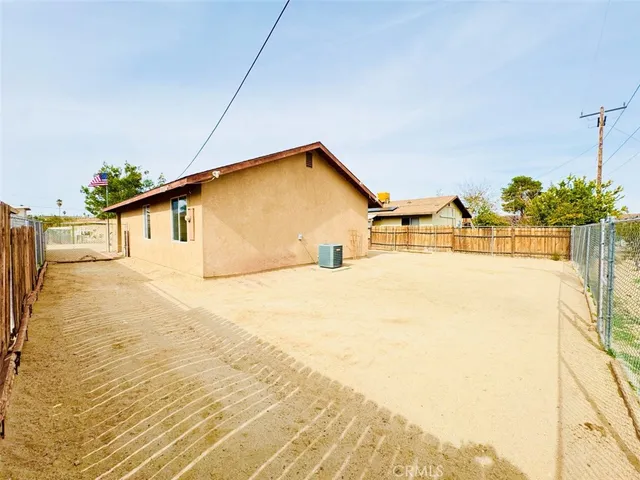 a house view with a outdoor space