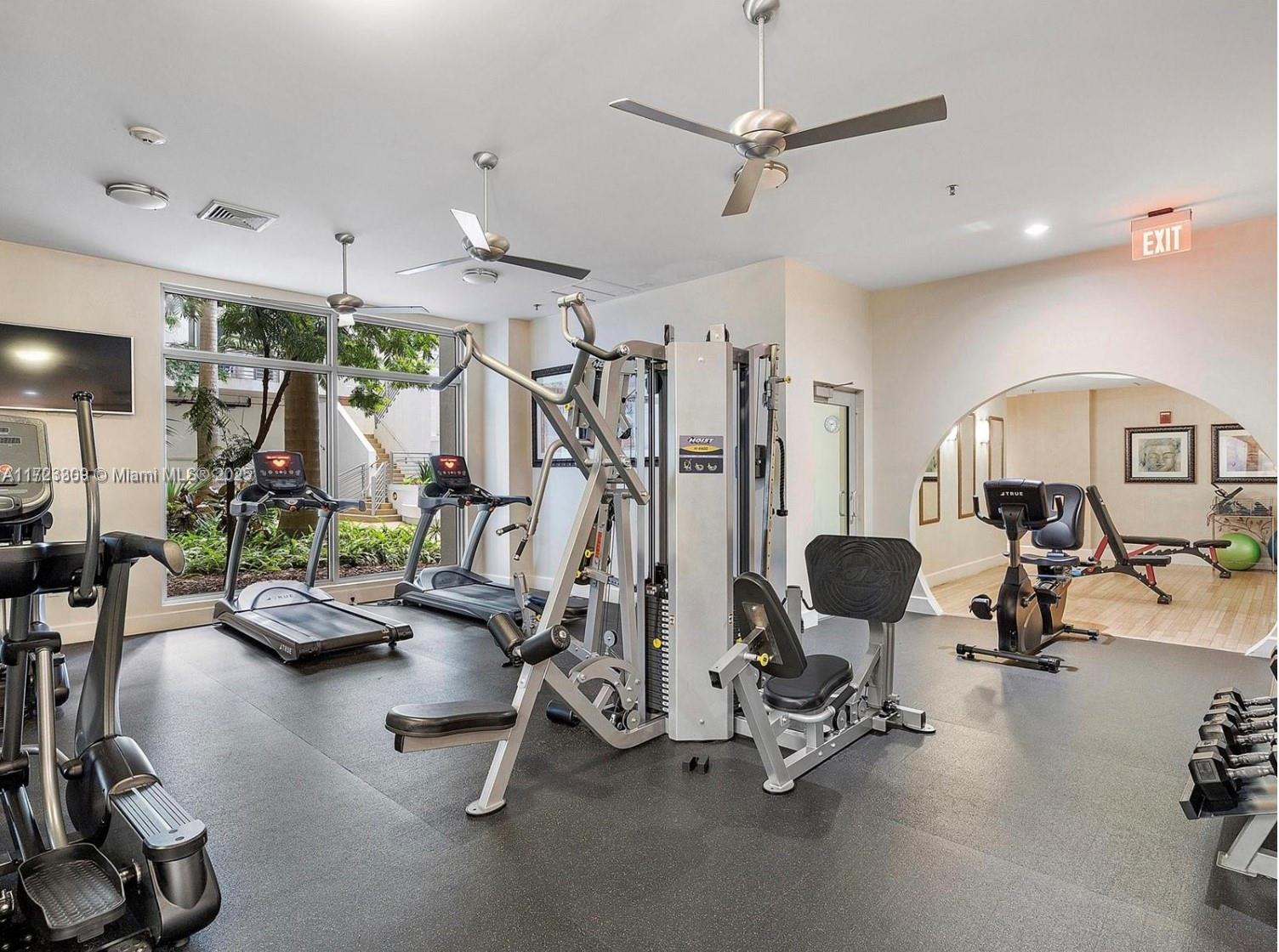 1830 Radius Drive, Unit 516 Hollywood, FL 33020 - Photo 13 of 28 a view of a room with gym equipment