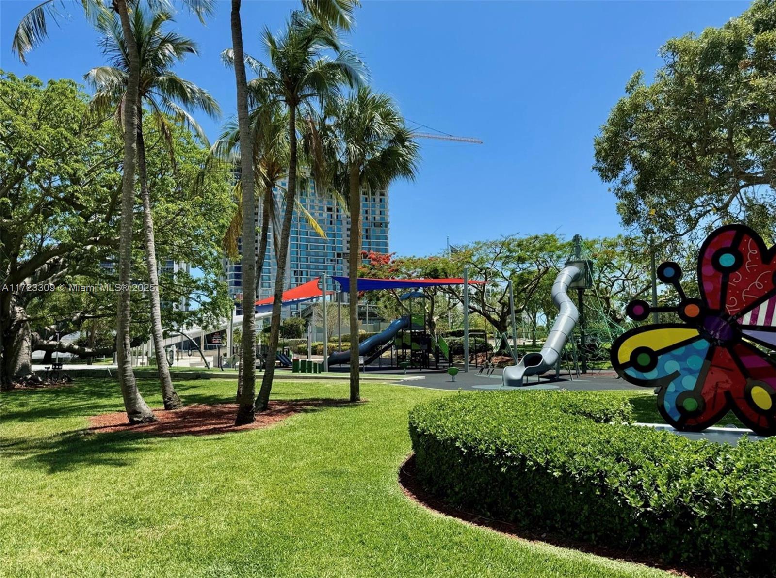 1830 Radius Drive, Unit 516 Hollywood, FL 33020 - Photo 20 of 28 a view of a park with large trees