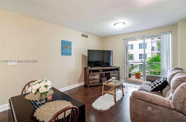 a kitchen with stainless steel appliances a refrigerator and a stove