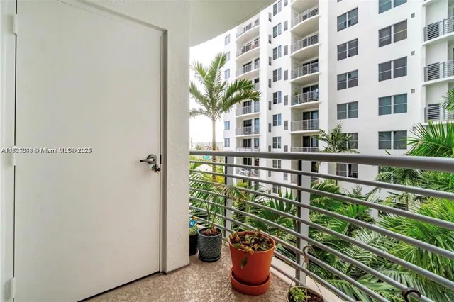 a bathroom with a granite countertop sink a bathtub and a shower