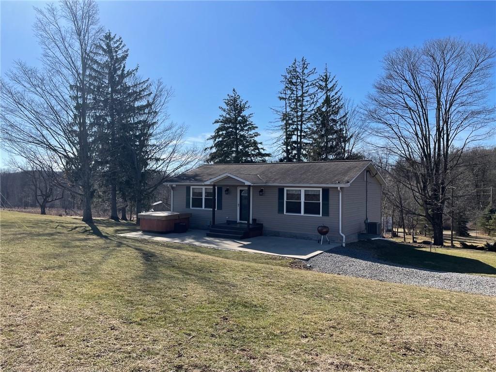 1061 Eakin Road Emlenton, PA 16373 - Photo 1 of 15 a view of a house with a yard covered in snow