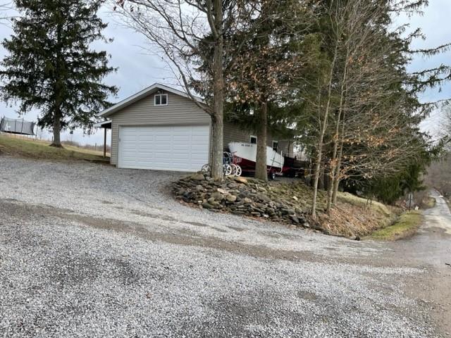 1054 Eakin Road Emlenton, PA 16373 - Photo 11 of 15 a front view of a house with a yard