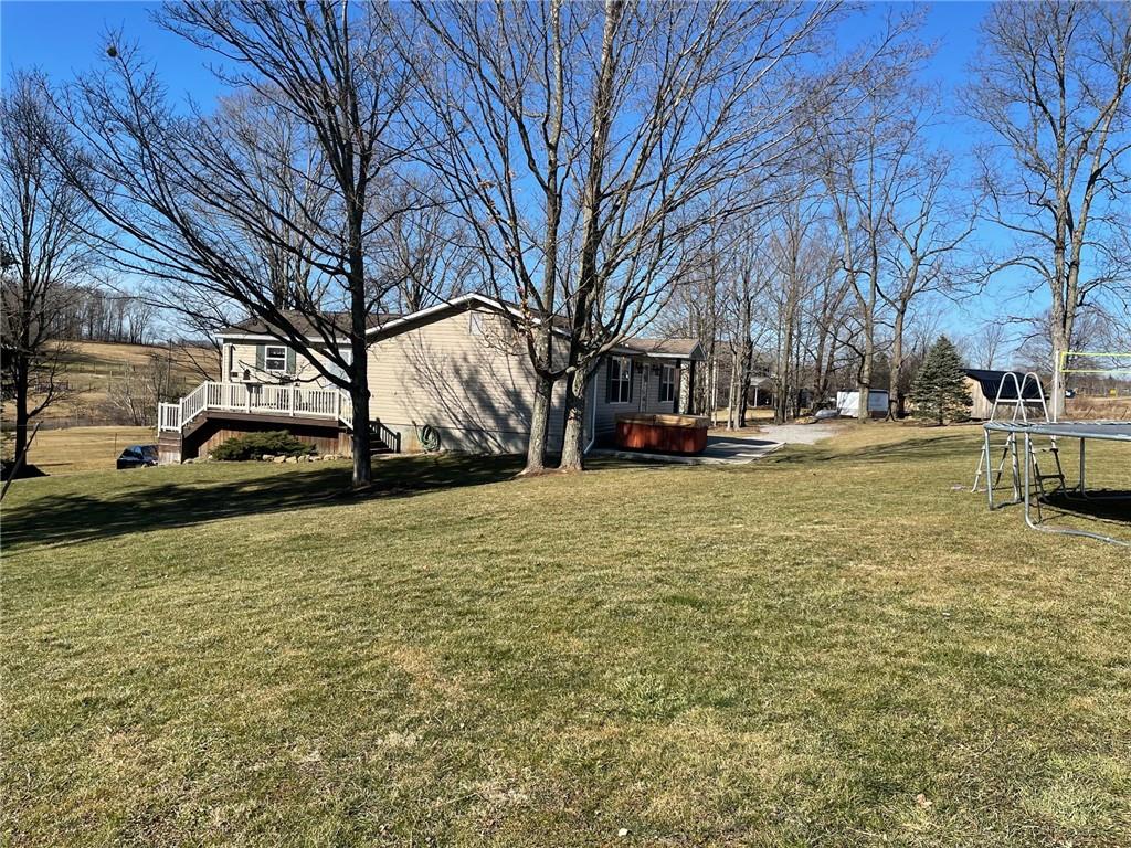 1054 Eakin Road Emlenton, PA 16373 - Photo 2 of 15 a view of a yard with parking space
